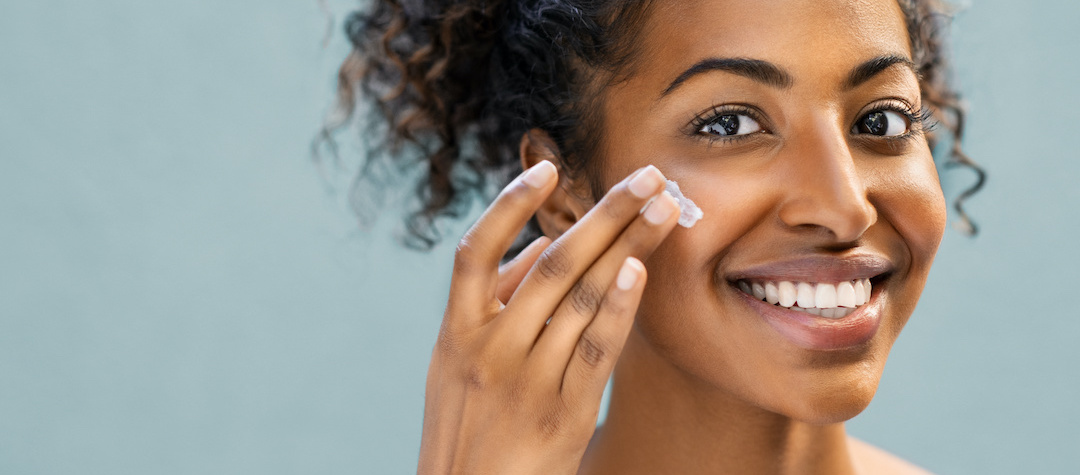 Woman Using Anti-Aging Treatment